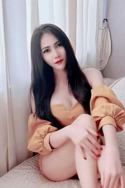 Girl APPLE posing gracefully – available for massage companionship in Bukit Indah 1.