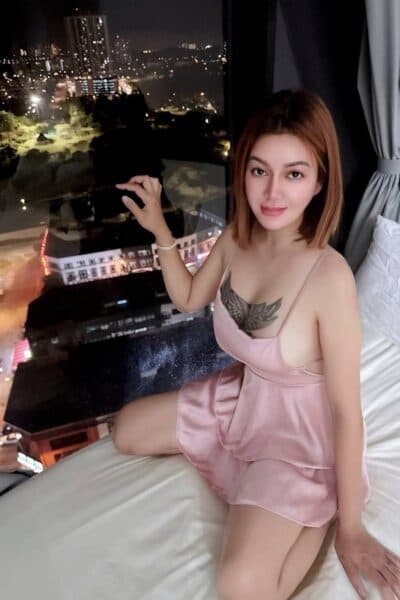 Girl ANNA posing gracefully – available for massage companionship in Bukit Indah 3.