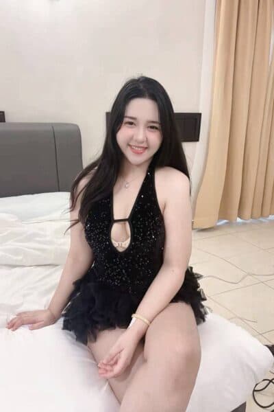 Girl AVA posing gracefully – available for massage companionship in Bukit Indah 3.