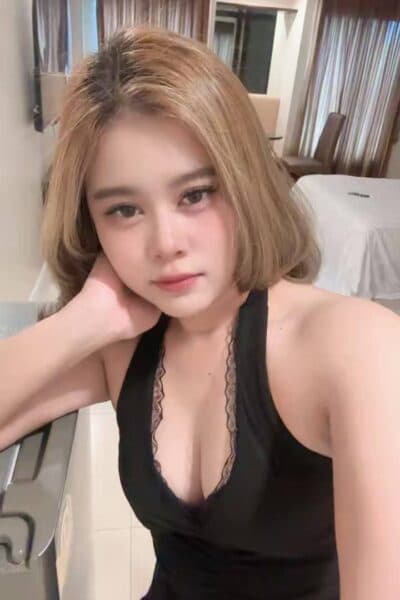 Girl IVY posing gracefully – available for massage companionship in Bukit Indah 3.